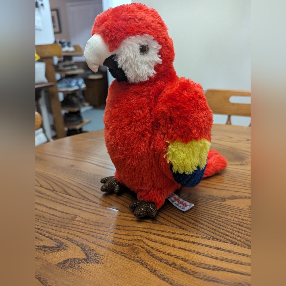 Aurora Plush Parrot. 10 inches tall. GUC.  Red, yellow,blue, white, black, brown
